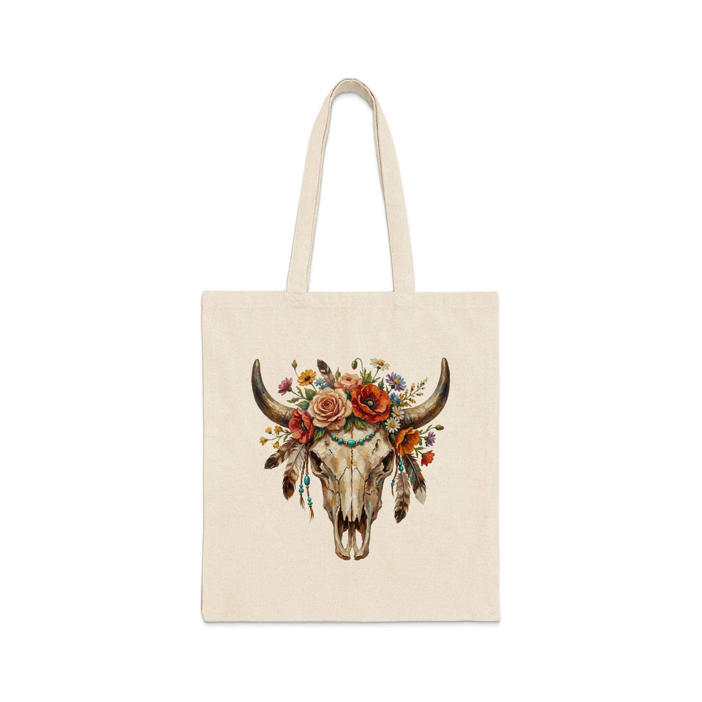 Tote bag with a decorative steer skull featuring flowers and feathers.