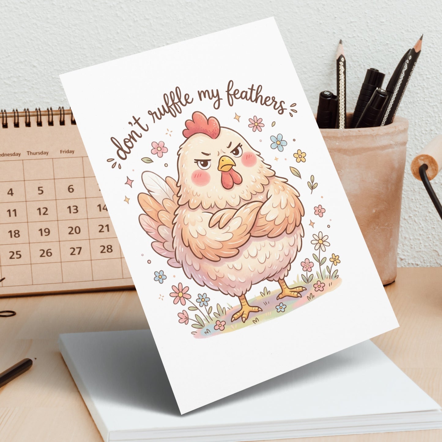 Cute cartoon chicken with text "don't ruffle my feathers".