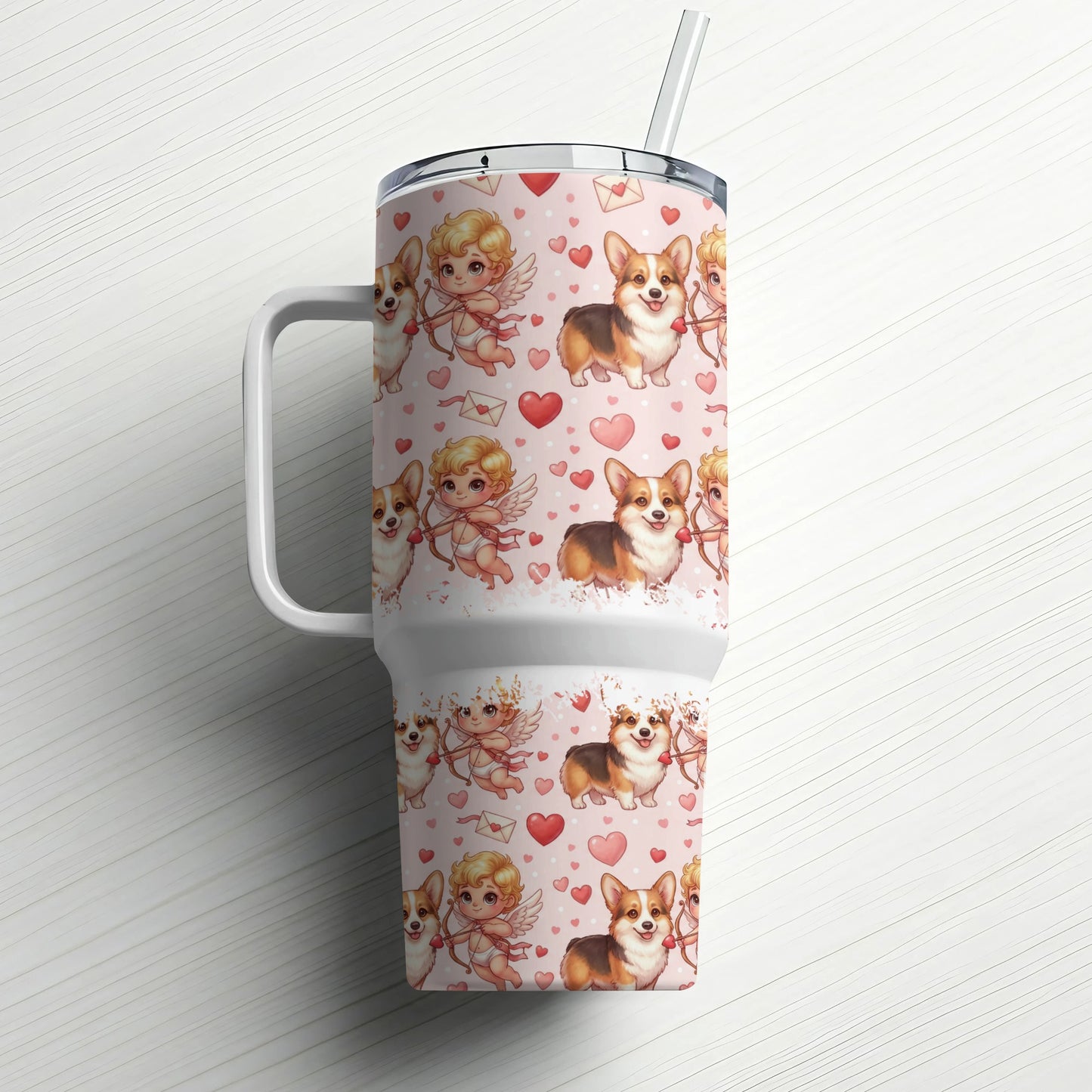 Pink tumbler with corgis and cupids, heart pattern.