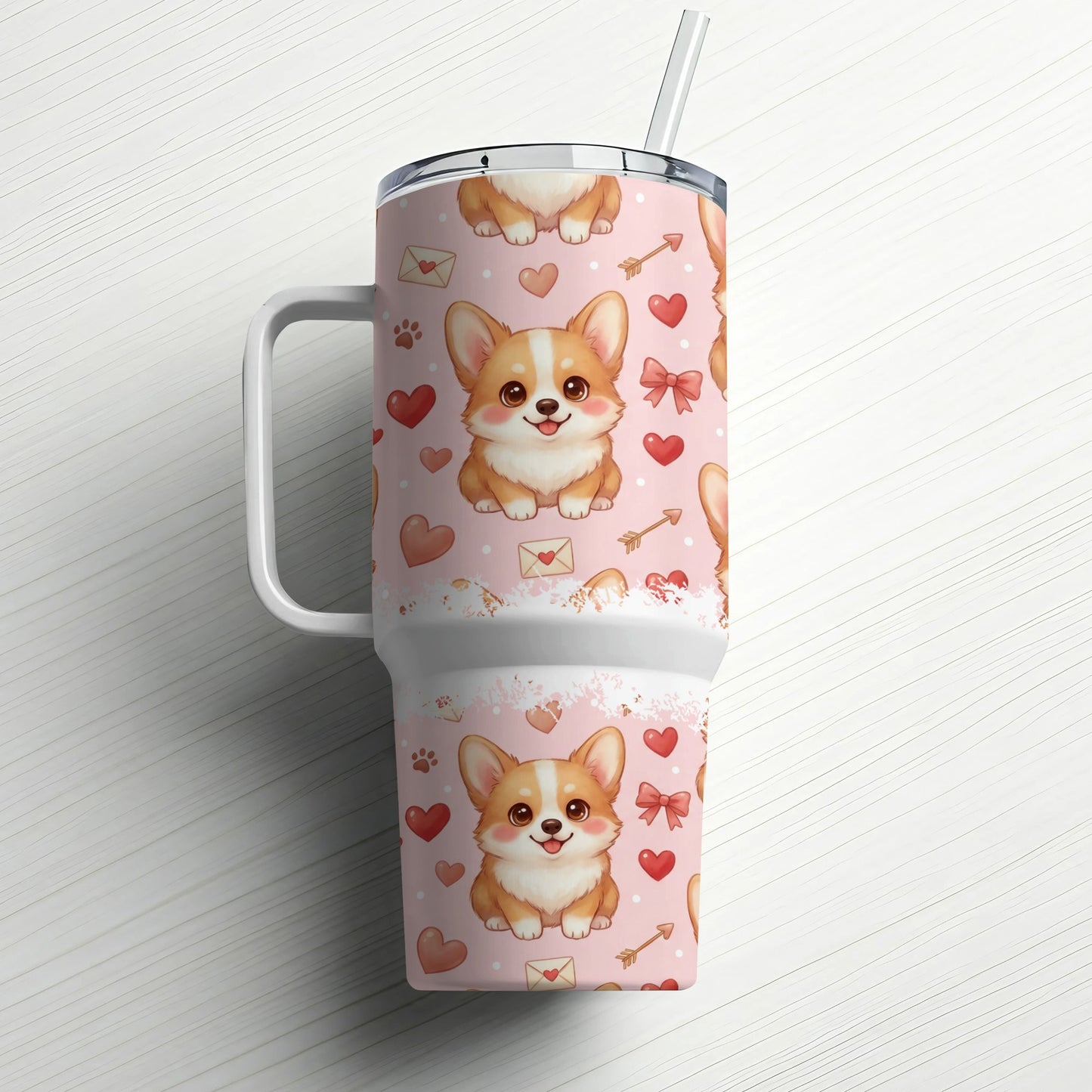 Pink tumbler with repeating corgi, heart, and arrow pattern and straw.