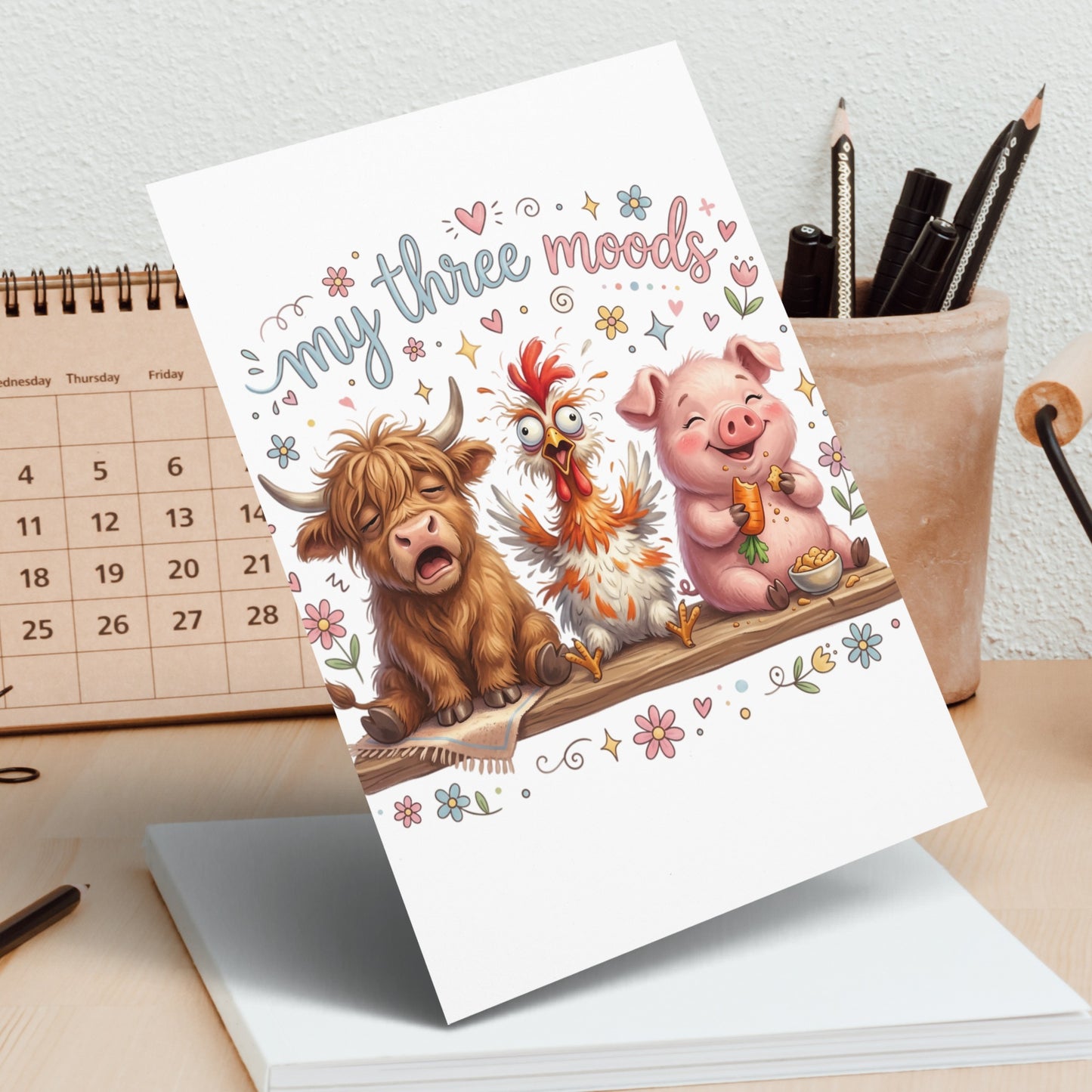 Greeting card with "my three moods" text and cartoon cow, chicken, and pig.