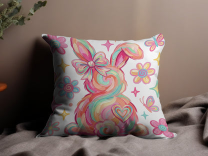 Easter bunny pillow with flowers and butterflies.