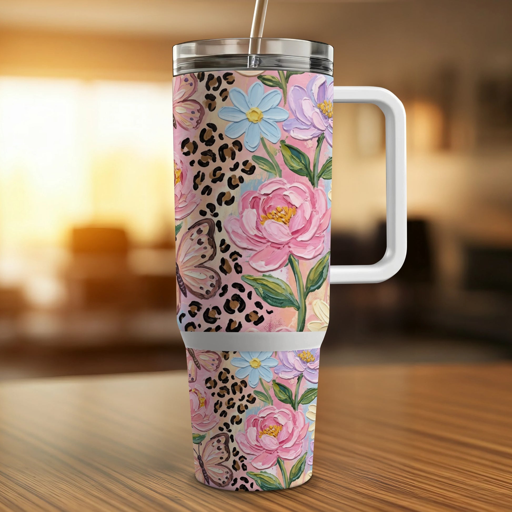Pink floral and butterfly tumbler with leopard print accents.