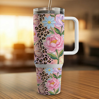 Pink floral and butterfly tumbler with leopard print accents.