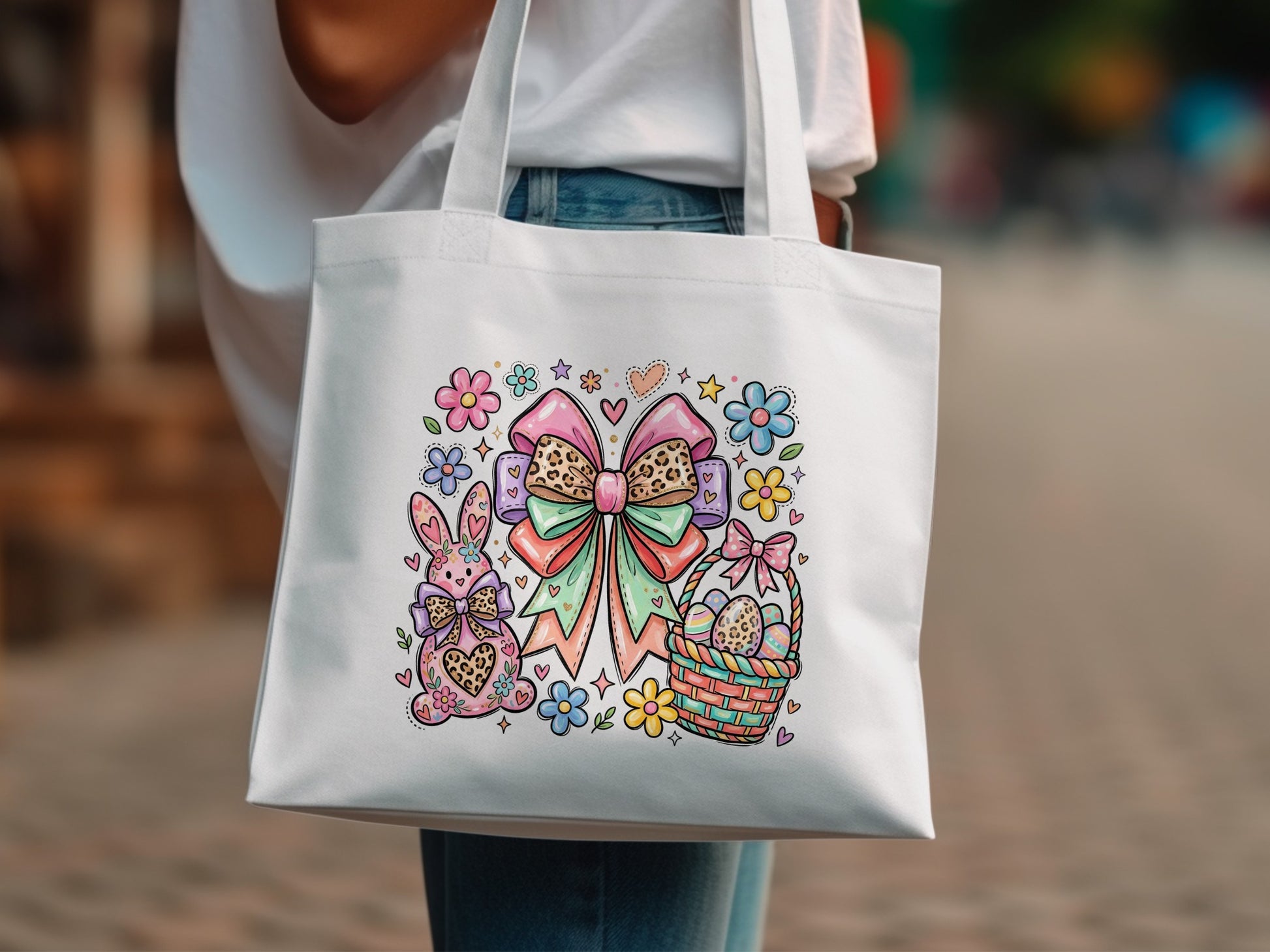 Easter tote bag with bunny, basket, and colorful bows and flowers.