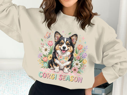 Corgi wearing a bandana surrounded by flowers, with text "Corgi Season".