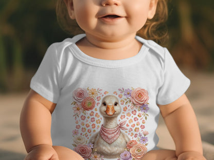 Baby in white bodysuit with a duck and flowers graphic.