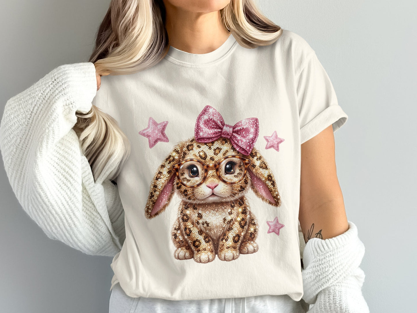 Sparkly leopard print bunny with glasses and pink bow on white t-shirt.