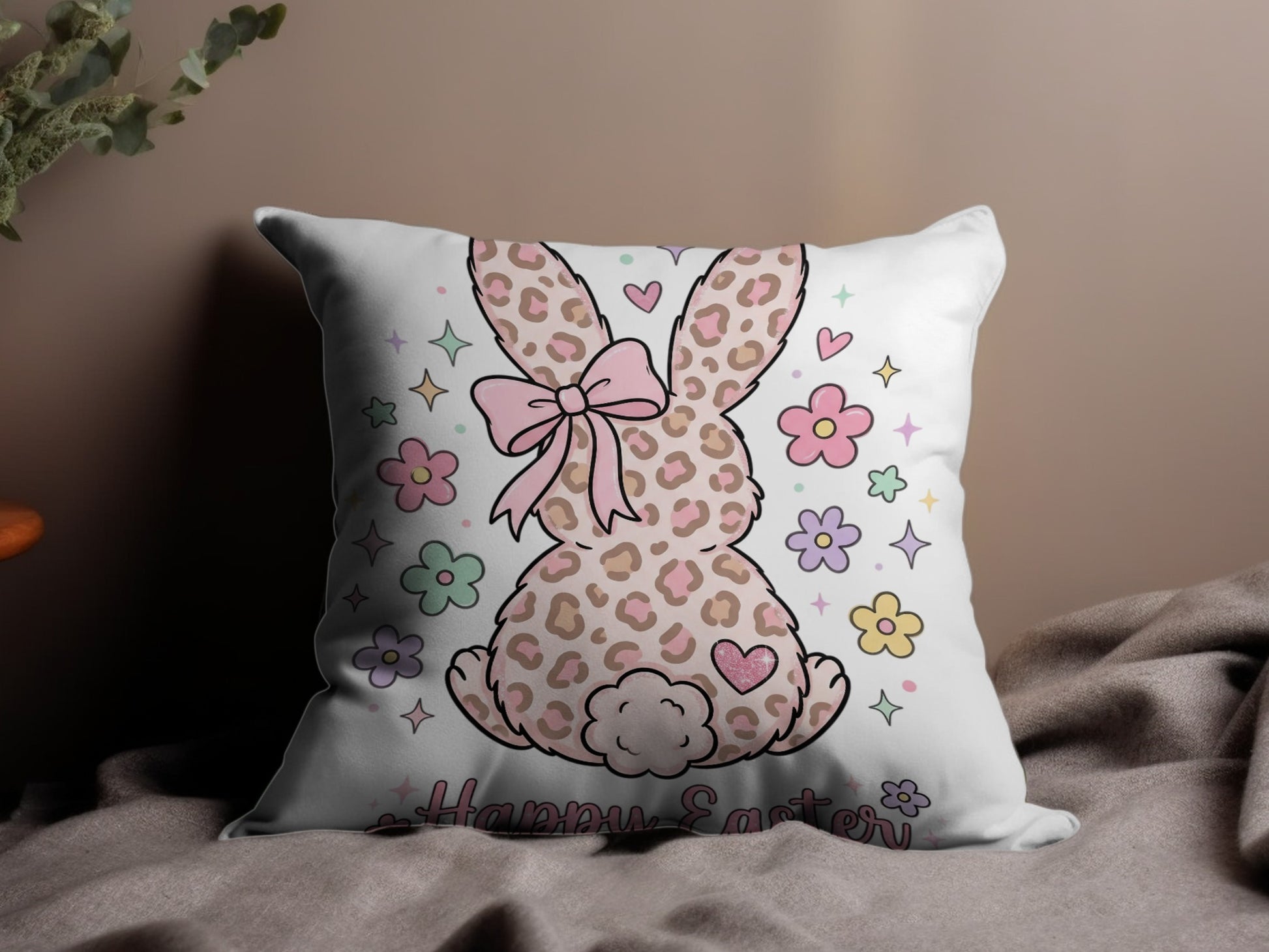 Leopard print bunny with pink bow, "Happy Easter" text, surrounded by pastel flowers.
