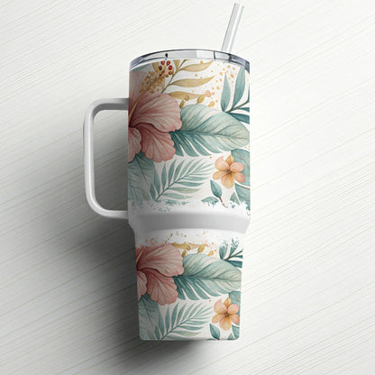 White tumbler with a floral and leaf pattern and a straw.