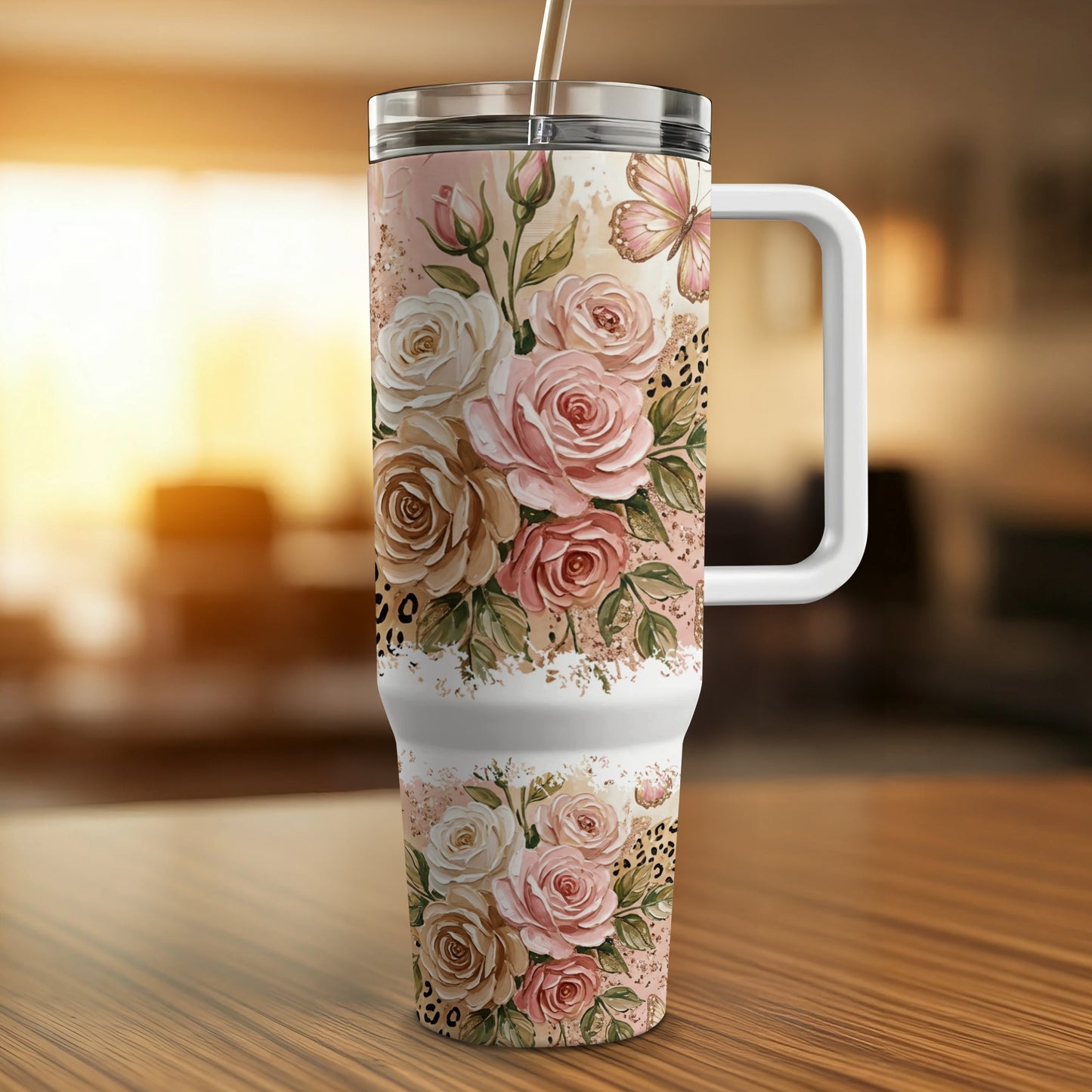 Tumbler with pink and white roses and a butterfly.