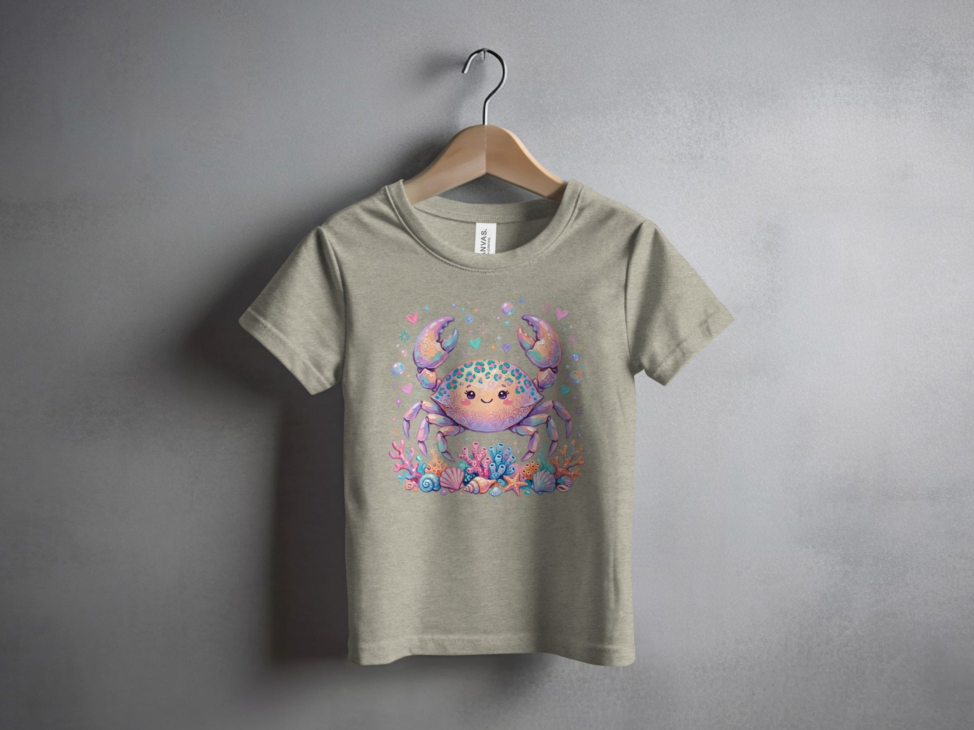 T-shirt with a cartoon crab graphic surrounded by coral and seashells.