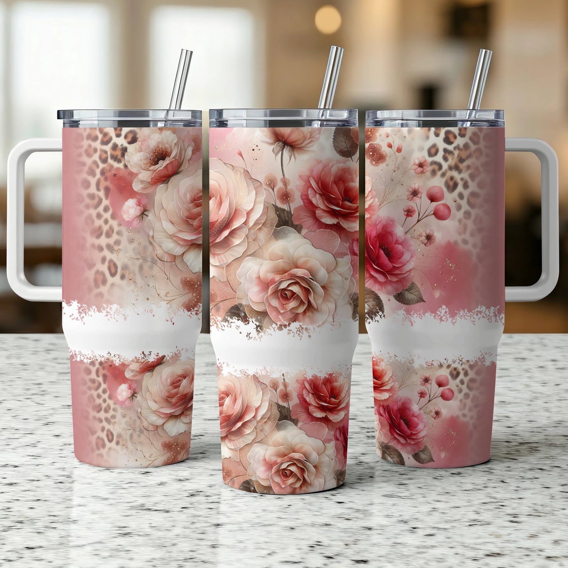 Three tumblers with floral and leopard print designs.