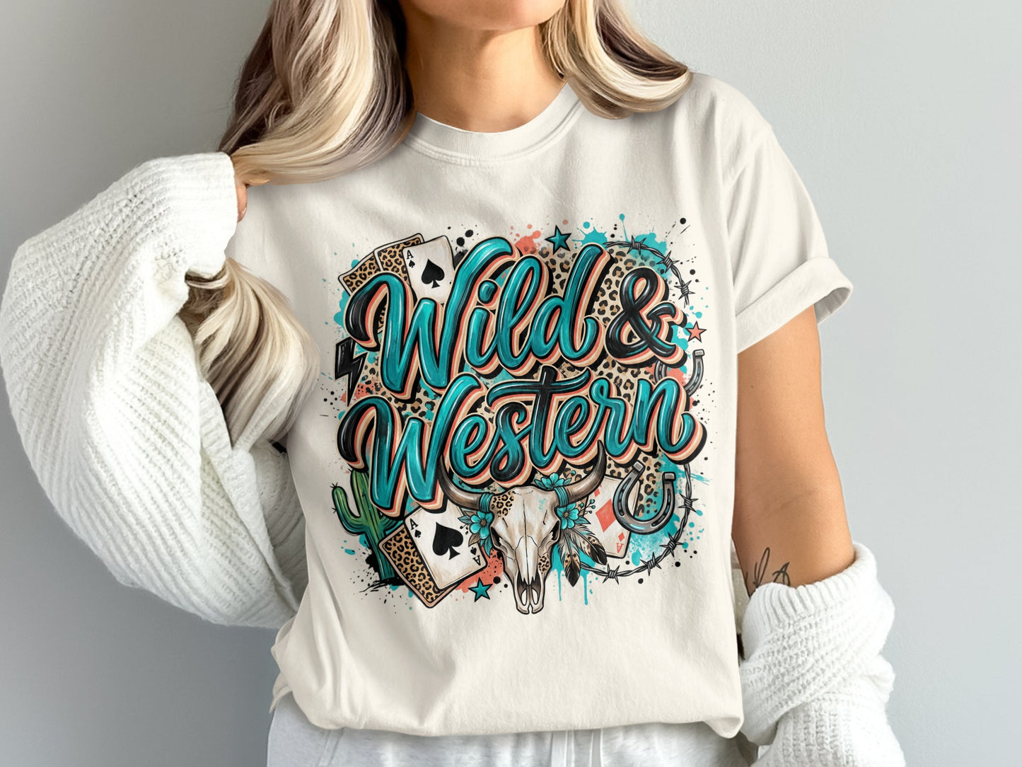 T-shirt with "Wild & Western" text, skull, cacti, and playing cards.