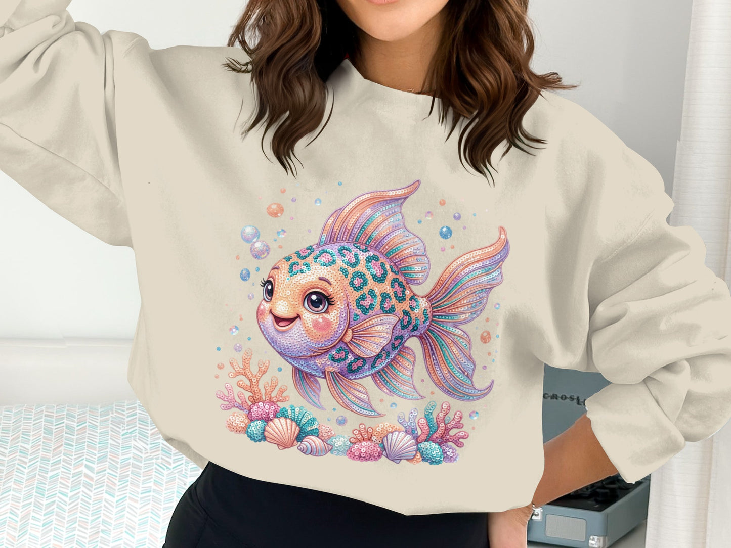 Crewneck sweatshirt with a colorful cartoon goldfish and coral print.