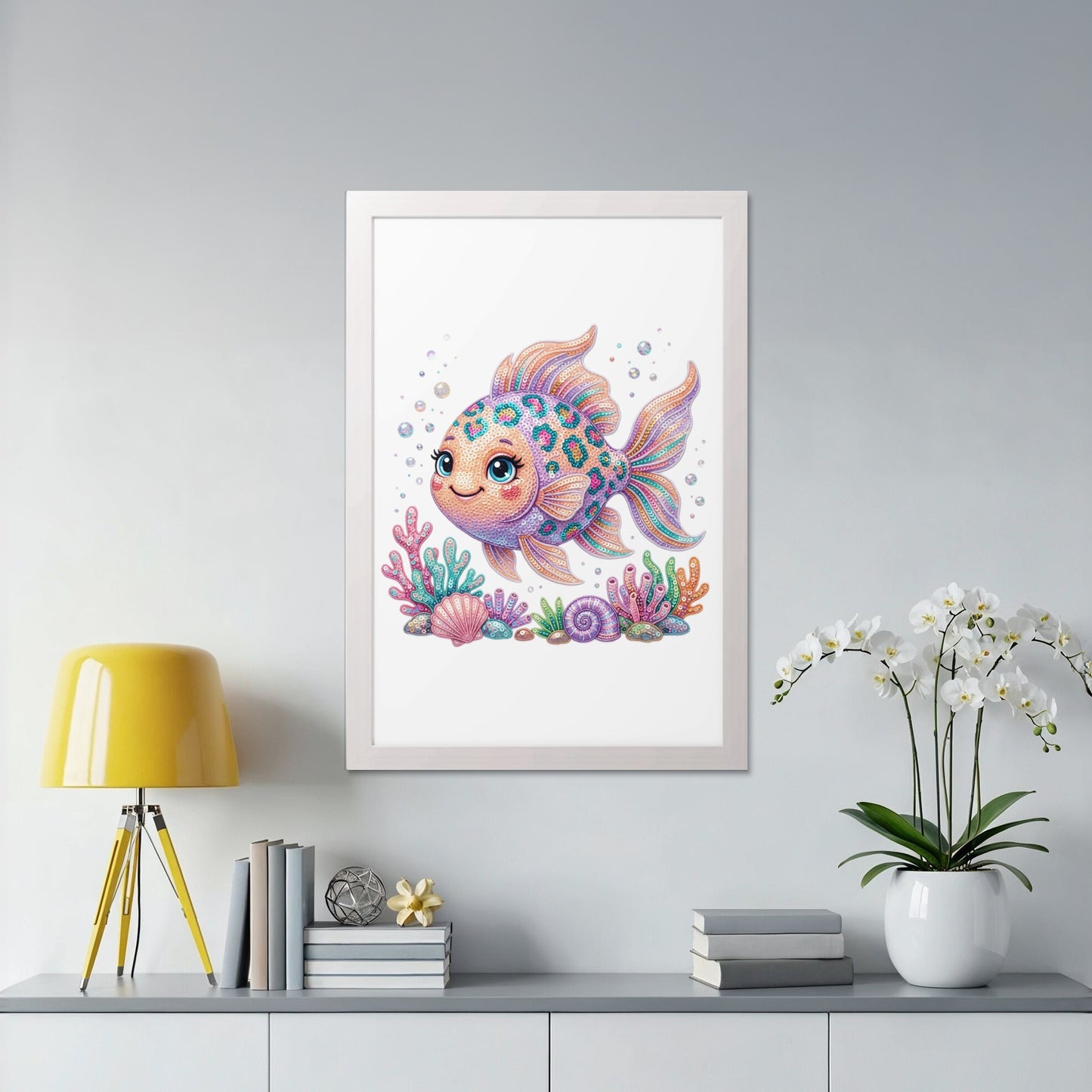 Colorful beaded fish artwork with coral and seashells, framed.