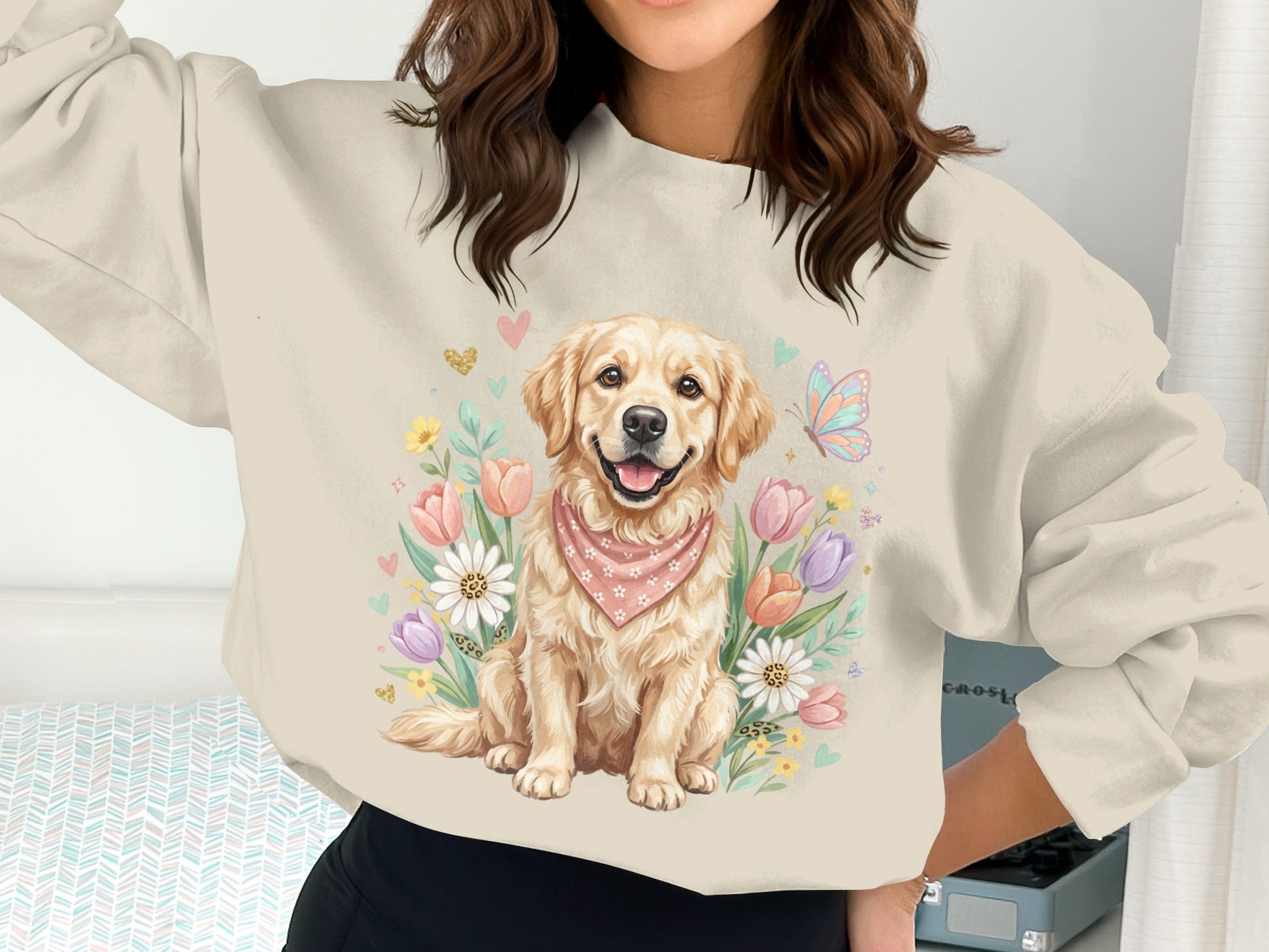 Golden Retriever with bandana and floral design on a cream sweatshirt.