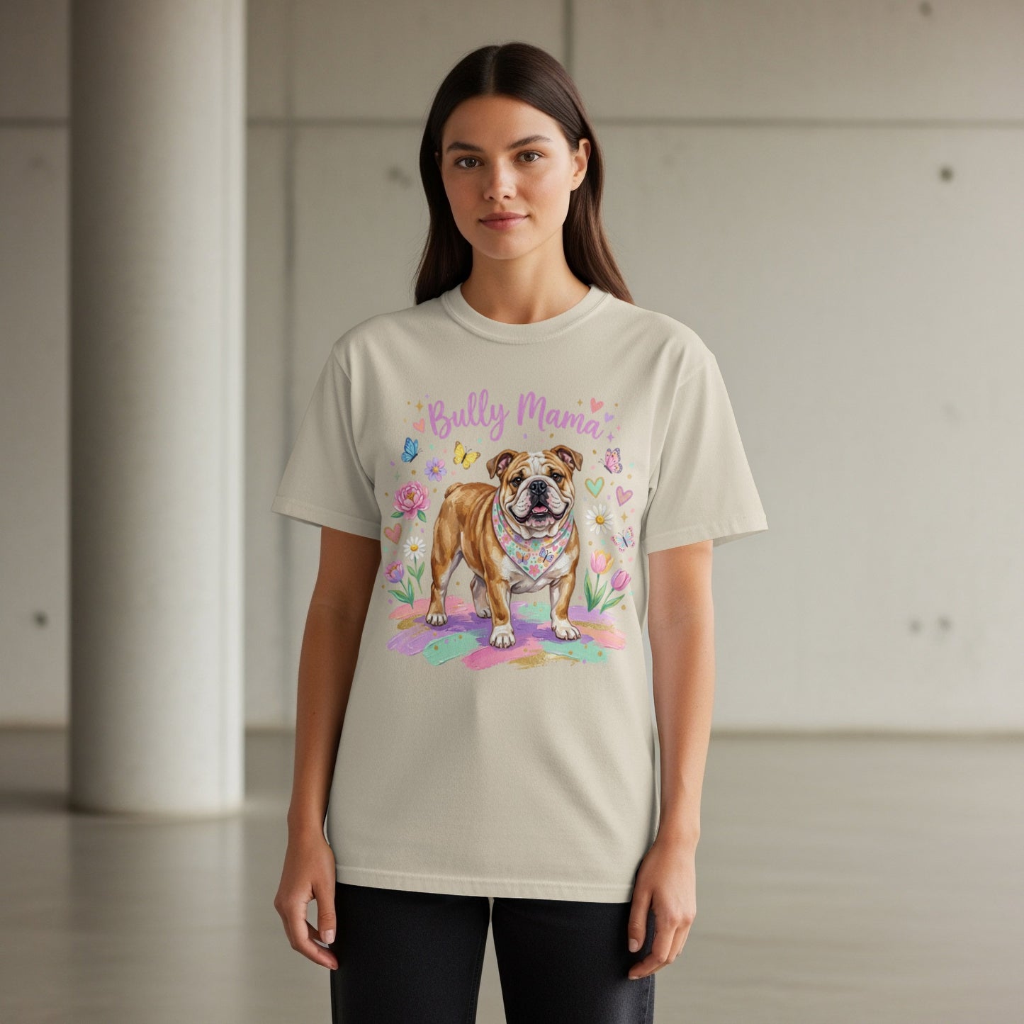 Bulldog graphic with "Bully Mama" text and floral accents on a cream t-shirt.