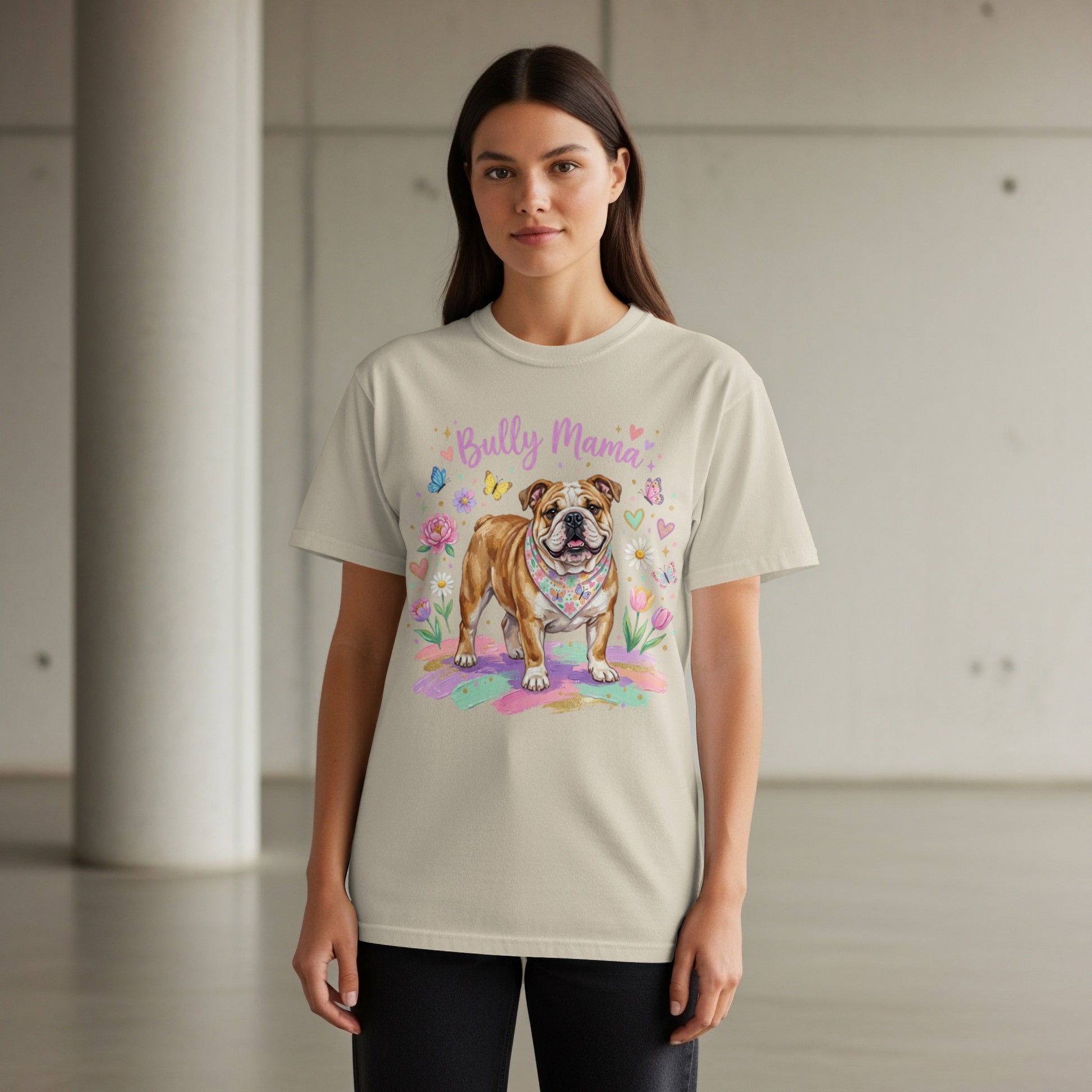 Bulldog graphic with "Bully Mama" text and floral accents on a cream t-shirt.
