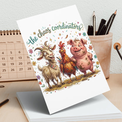 Greeting card with "the chaos coordinators" text and cartoon goat, chicken, and pig.
