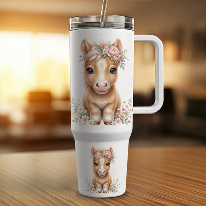 White tumbler with floral horse graphic and straw.