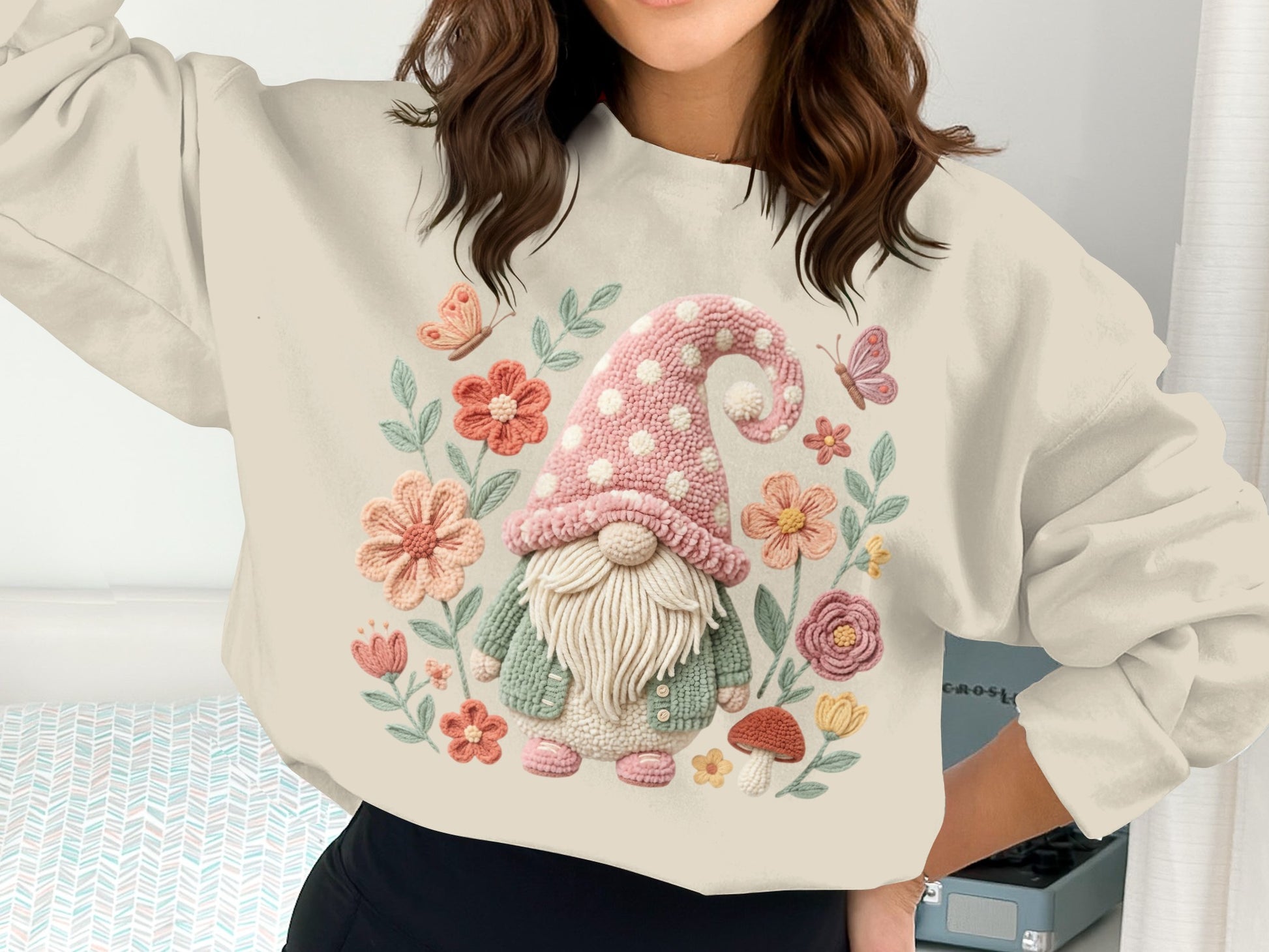 Sweatshirt featuring a gnome wearing a polka dot hat, surrounded by flowers and butterflies.