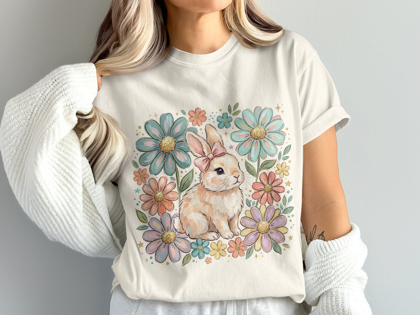 Cream t-shirt with a watercolor bunny and floral design.