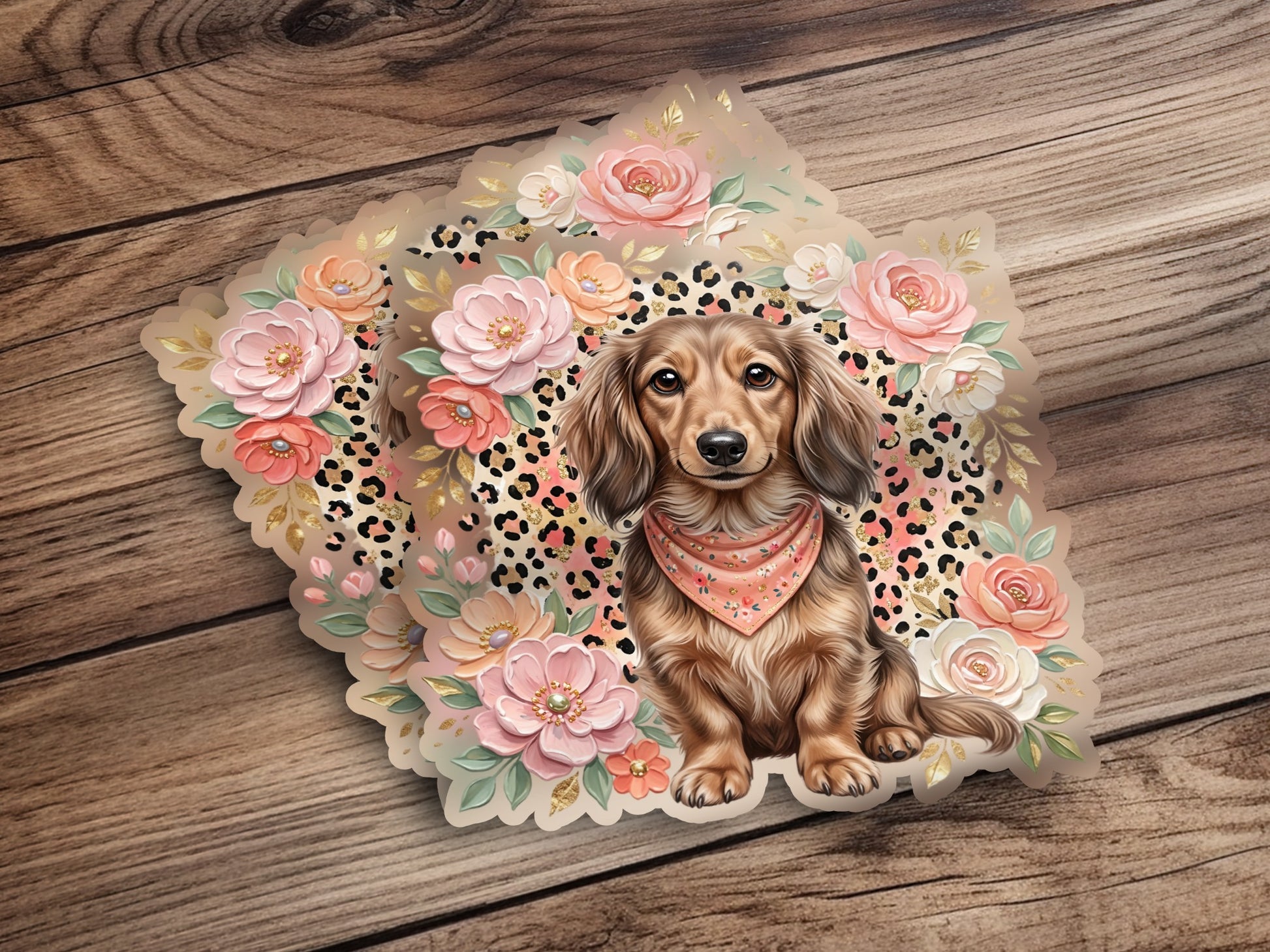 Dachshund wearing a bandana sits in front of floral and leopard print design.