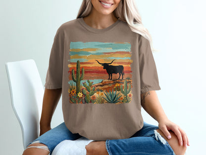Brown t-shirt with desert scene featuring longhorn bull and cacti.