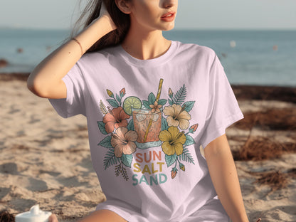 T-shirt with floral design and drink, featuring "Sun Salt Sand" text.