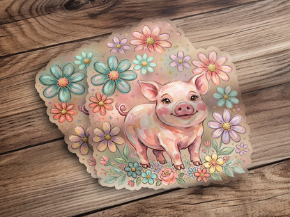 Cute piglet surrounded by pastel flowers on a wooden background.