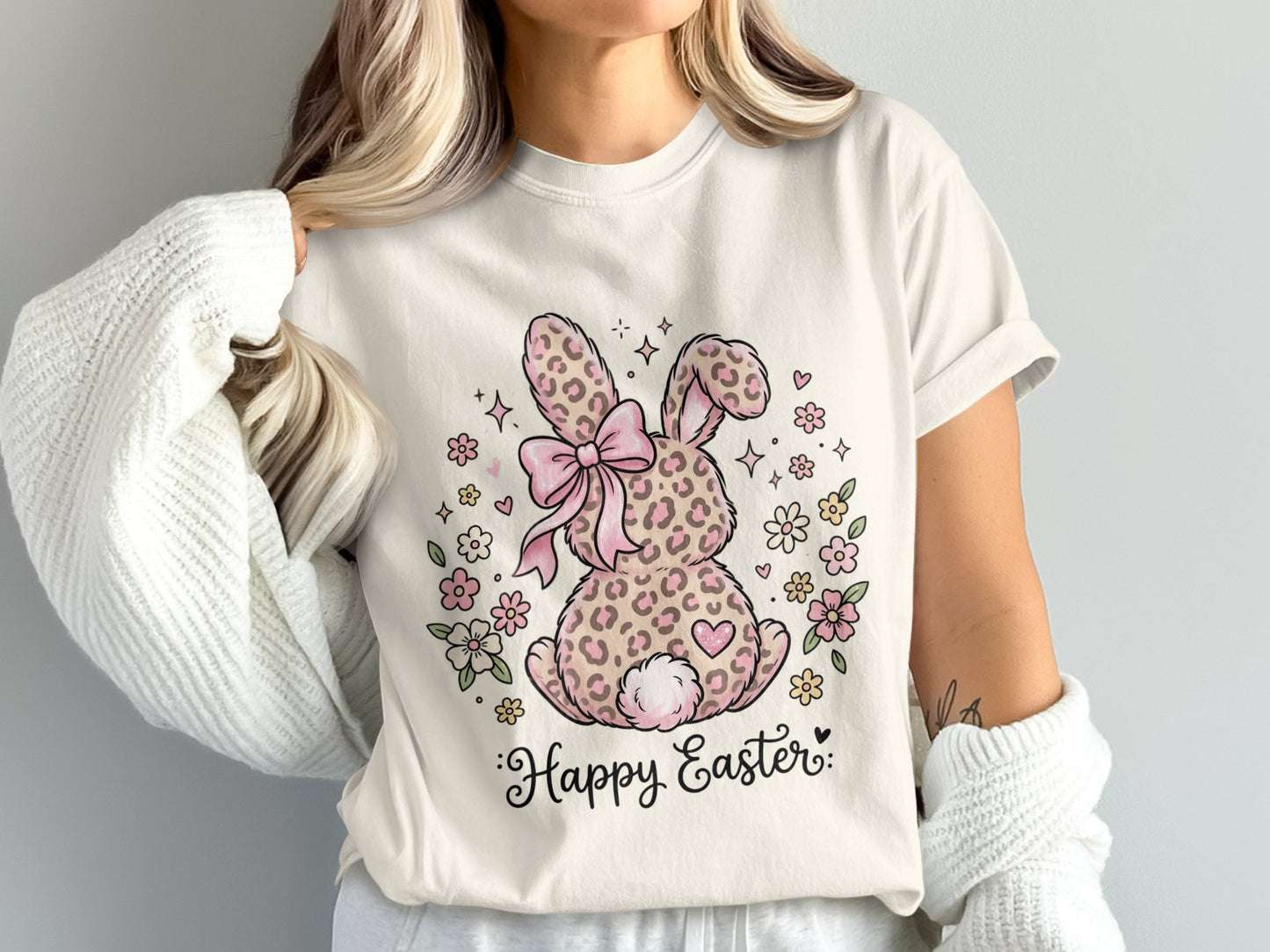 Leopard print Easter bunny with bow and "Happy Easter" text.