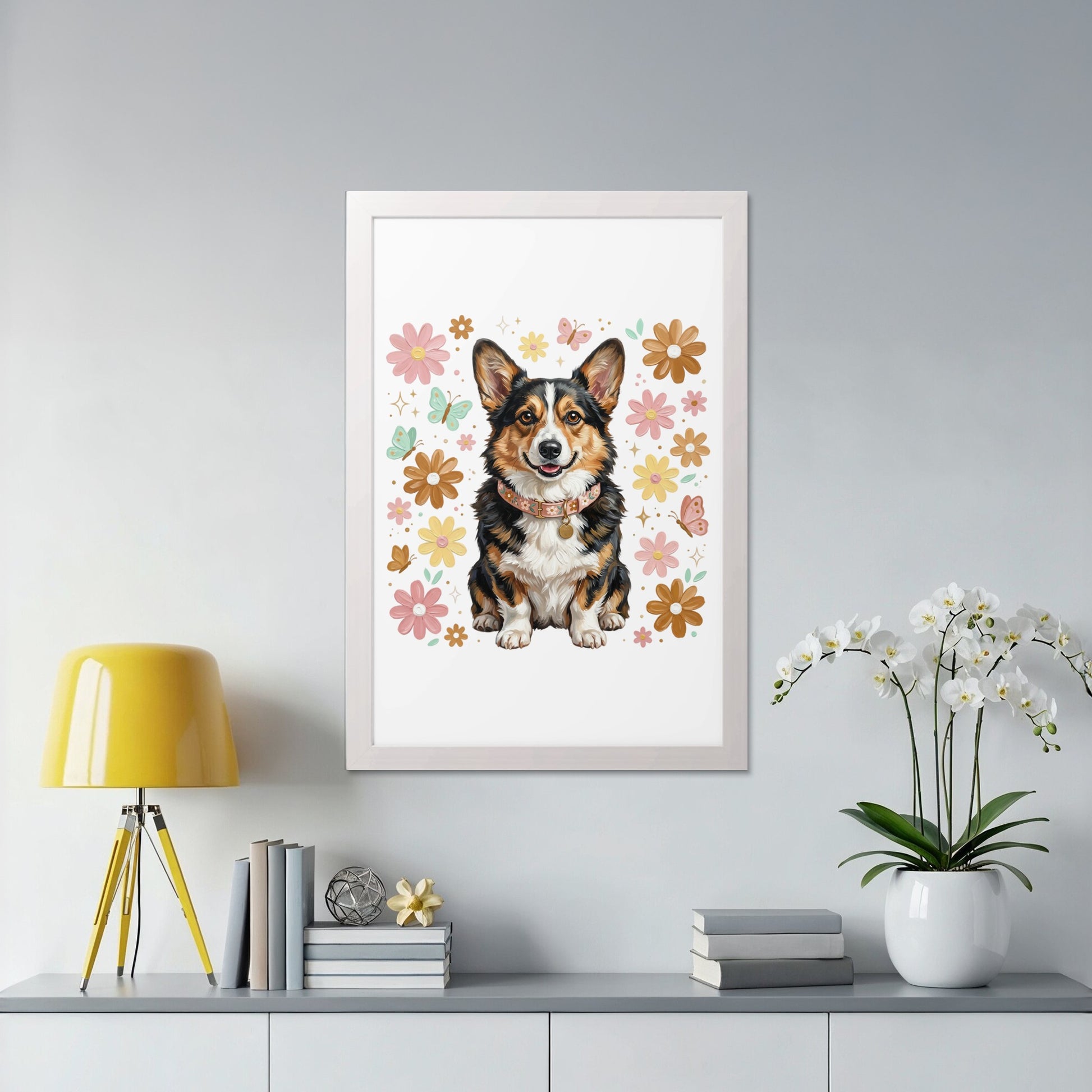Framed watercolor portrait of a smiling corgi surrounded by flowers and butterflies.