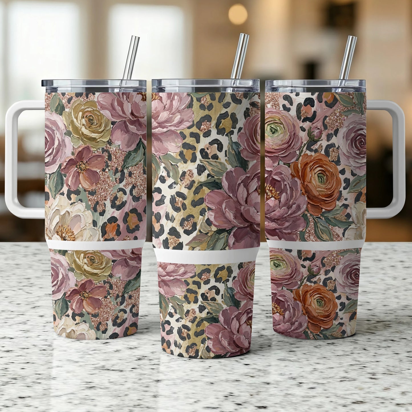 Three tumblers with floral and leopard print designs.
