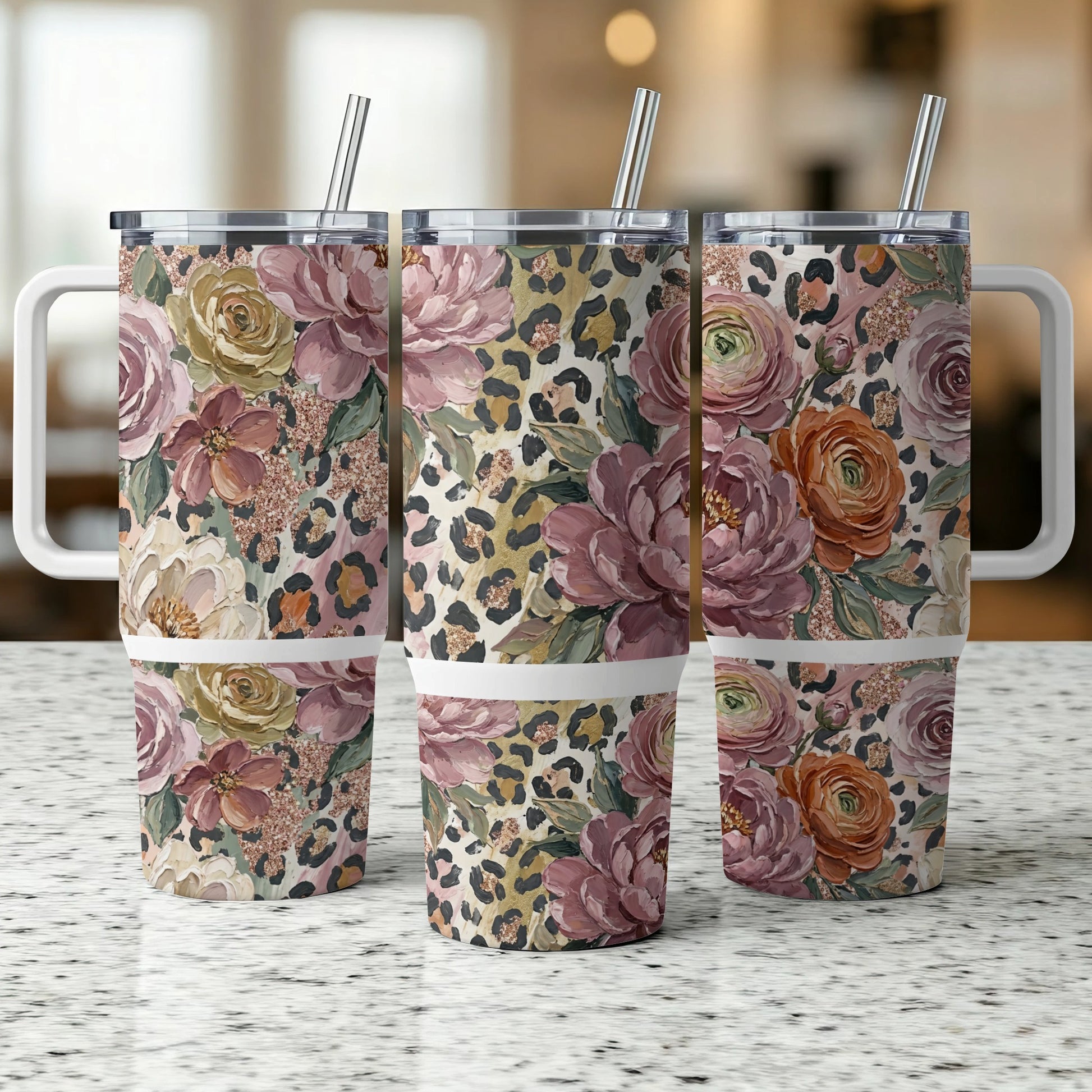 Three tumblers with floral and leopard print designs.