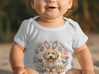 Baby wearing white bodysuit with Easter bunny and floral design.