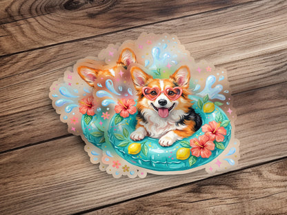 Corgi wearing heart-shaped sunglasses in a pool float with flowers.