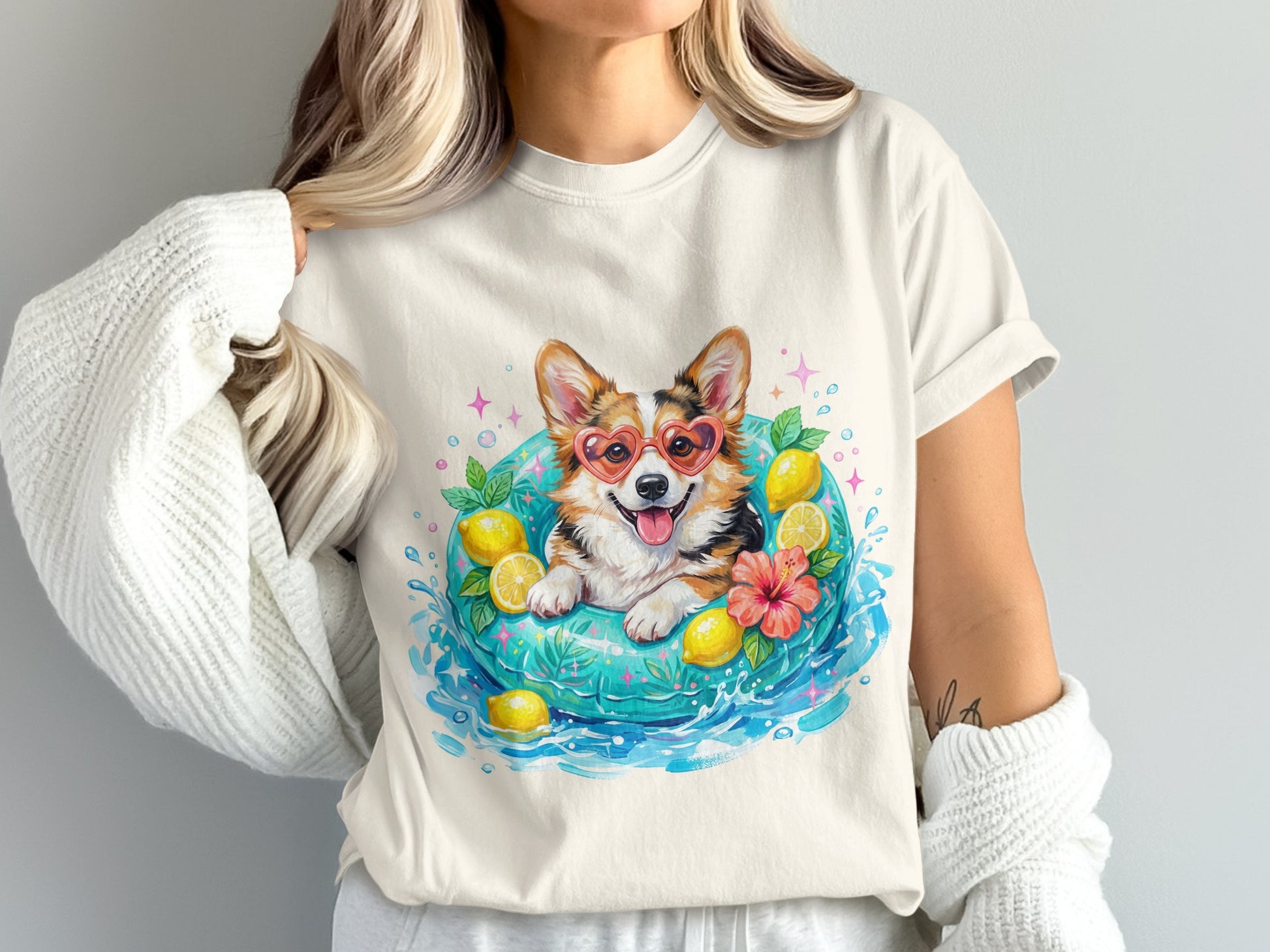 Corgi wearing heart sunglasses in a lemon-themed inner tube.