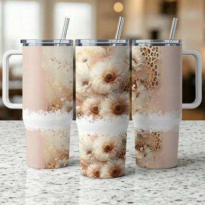 Three tumblers with floral and leopard print designs.
