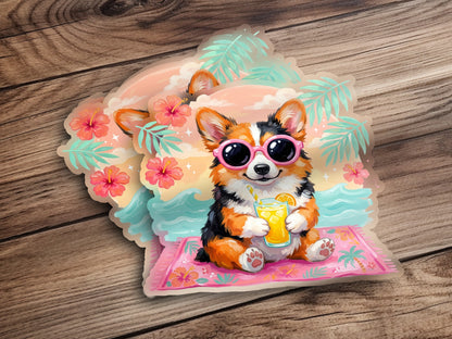 Corgi wearing sunglasses, holding a drink, sitting on a beach towel.