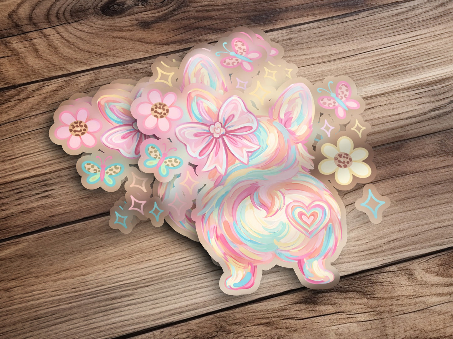 Corgi butt sticker with pastel flowers, butterflies, and glitter accents.