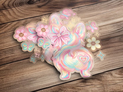 Corgi butt sticker with pastel flowers, butterflies, and glitter accents.