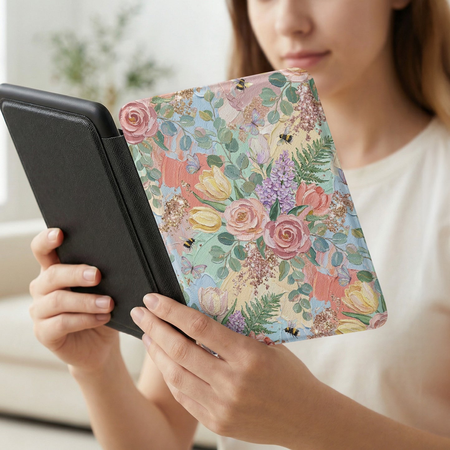 Floral pattern e-reader cover with bees and butterflies.
