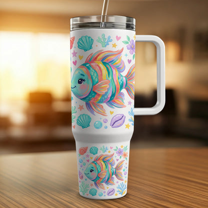 Colorful fish and seashells pattern on white tumbler with handle and straw.