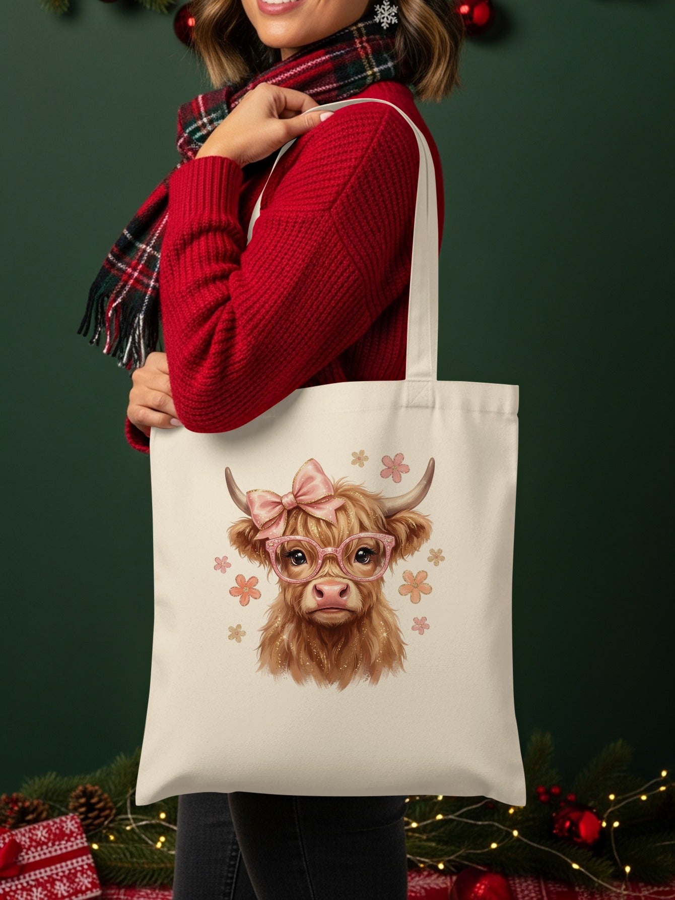 Tote bag featuring a Highland cow with pink glasses and bow.