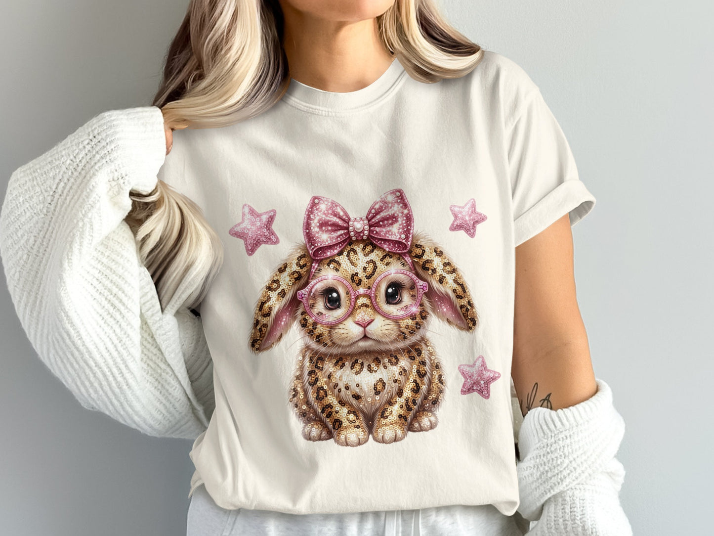 T-shirt with leopard print bunny wearing pink glasses and a bow.