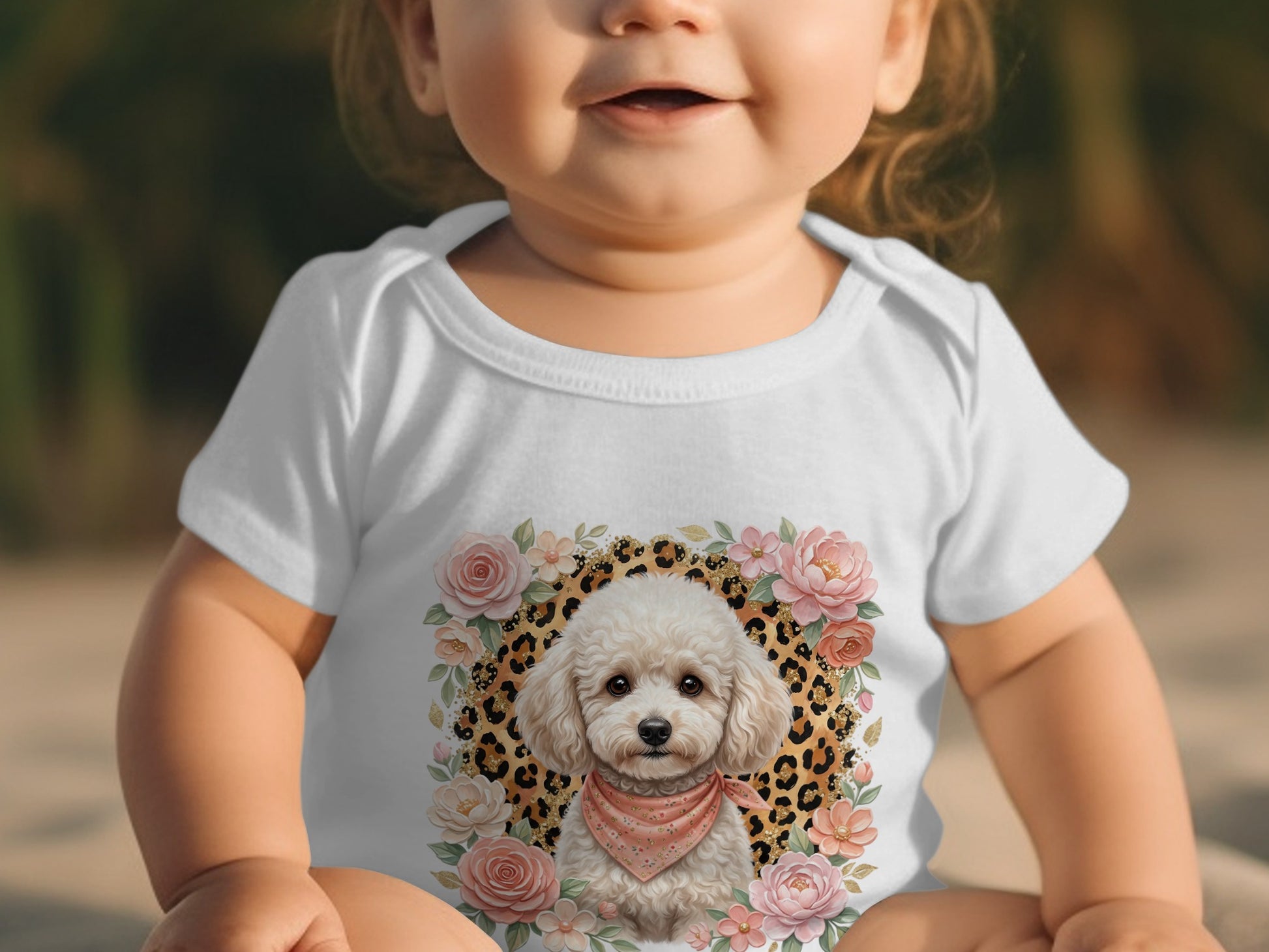 White baby onesie with poodle and floral print.