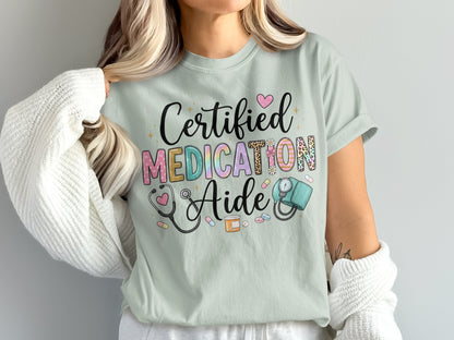 Certified Medication Aide graphic tee with medical icons and leopard print.