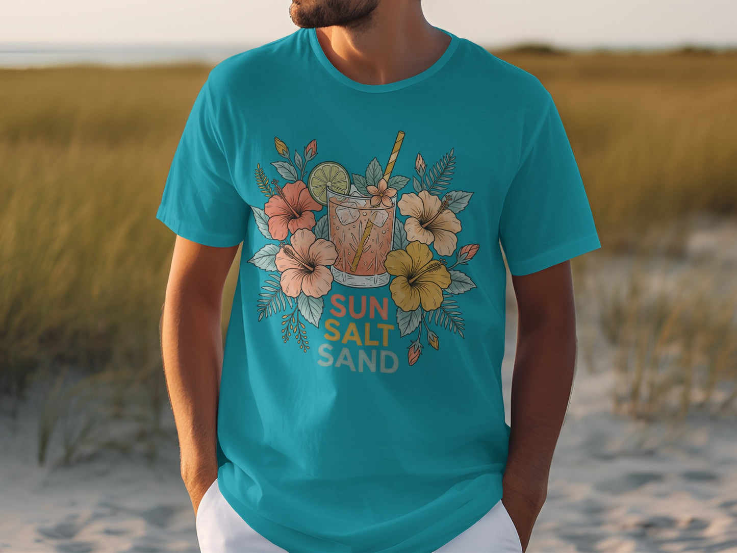 Teal t-shirt with "Sun Salt Sand" and floral cocktail graphic.