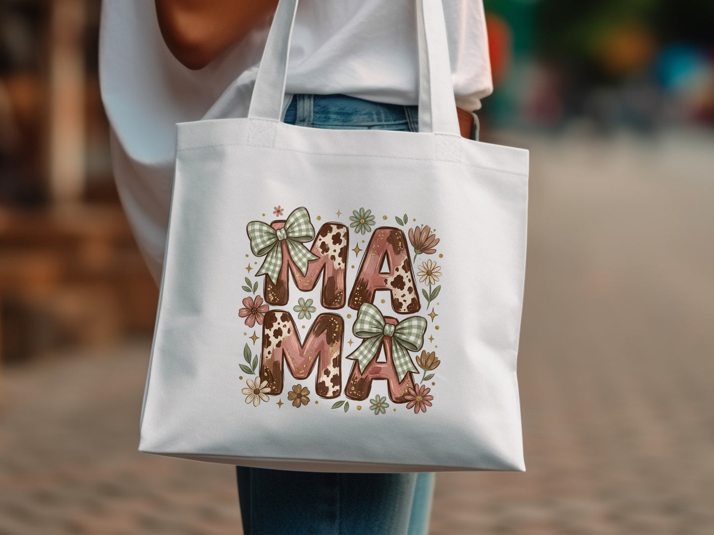 "MAMA" text on a white tote bag with floral and gingham accents.